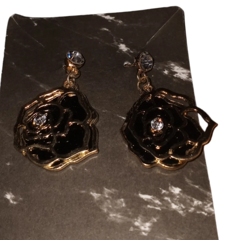 black and gold toned rose dangle earrings